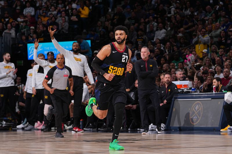 DENVER, CO - MARCH 7: Jamal Murray #27 of the Denver Nuggets looks on during the game against the Boston Celtics on March 7, 2024 at the Ball Arena in Denver, Colorado. NOTE TO USER: User expressly acknowledges and agrees that, by downloading and/or using this Photograph, user is consenting to the terms and conditions of the Getty Images License Agreement. Mandatory Copyright Notice: Copyright 2024 NBAE (Photo by Bart Young/NBAE via Getty Images)