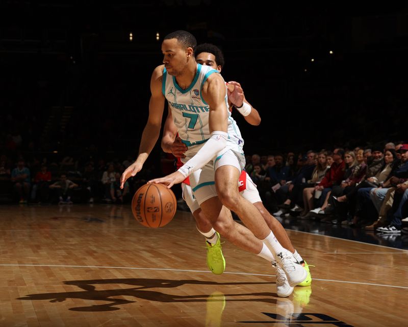 WASHINGTON, DC -? MARCH 8:  Bryce McGowans #7 of the Charlotte Hornets goes to the basket during the game on March 8, 2024 at Capital One Arena in Washington, DC. NOTE TO USER: User expressly acknowledges and agrees that, by downloading and or using this Photograph, user is consenting to the terms and conditions of the Getty Images License Agreement. Mandatory Copyright Notice: Copyright 2024 NBAE (Photo by Stephen Gosling/NBAE via Getty Images)