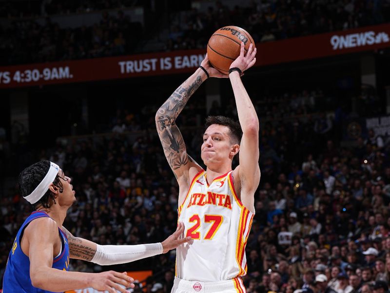 DENVER, CO - APRIL 6: Vit Krejci #27 of the Atlanta Hawks looks to pass the ball during the game against the Denver Nuggets on April 6, 2024 at the Ball Arena in Denver, Colorado. NOTE TO USER: User expressly acknowledges and agrees that, by downloading and/or using this Photograph, user is consenting to the terms and conditions of the Getty Images License Agreement. Mandatory Copyright Notice: Copyright 2024 NBAE (Photo by Garrett Ellwood/NBAE via Getty Images)