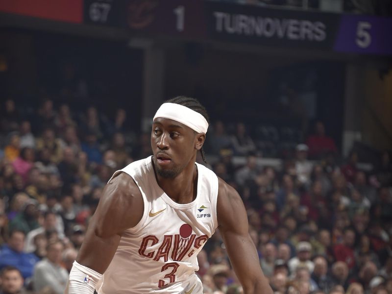 CLEVELAND, OH - MARCH 11: Caris LeVert #3 of the Cleveland Cavaliers handles the ball during the game against the Phoenix Suns on March 11, 2024 at Rocket Mortgage FieldHouse in Cleveland, Ohio. NOTE TO USER: User expressly acknowledges and agrees that, by downloading and/or using this Photograph, user is consenting to the terms and conditions of the Getty Images License Agreement. Mandatory Copyright Notice: Copyright 2024 NBAE (Photo by David Liam Kyle/NBAE via Getty Images)