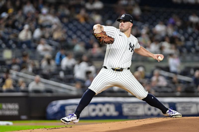 Sep 27, 2024; Bronx, New York, USA; New York Yankees pitcher Carlos Rodon (55) pitches against the Pittsburgh Pirates during the first inning at Yankee Stadium. Mandatory Credit: John Jones-Imagn Images