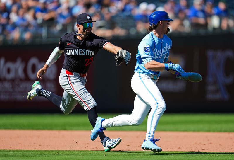 Sep 8, 2024; Kansas City, Missouri, USA; Kansas City Royals shortstop Bobby Witt Jr. (7) is tagged out by Minnesota Twins third baseman Royce Lewis (23) during the eighth inning at Kauffman Stadium. Mandatory Credit: Jay Biggerstaff-Imagn Images