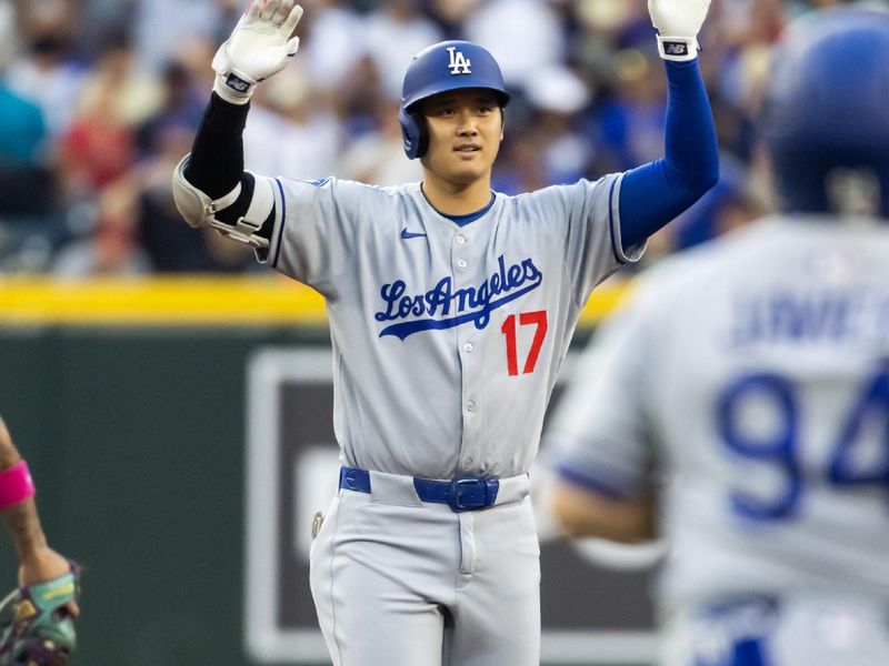 May 9, 2025; Phoenix, Arizona, USA; Arizona Diamondbacks designated hitter Shohei Ohtani celebrates after hitting a double in the first inning against the Los Angeles Dodgers at Chase Field. Mandatory Credit: Mark J. Rebilas-Imagn Images