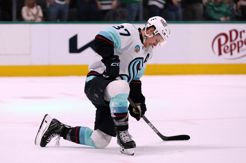 Apr 13, 2024; Dallas, Texas, USA; Seattle Kraken center Yanni Gourde (37) reacts after giving up a power play goal in the second period against the Dallas Stars at American Airlines Center. Mandatory Credit: Tim Heitman-USA TODAY Sports