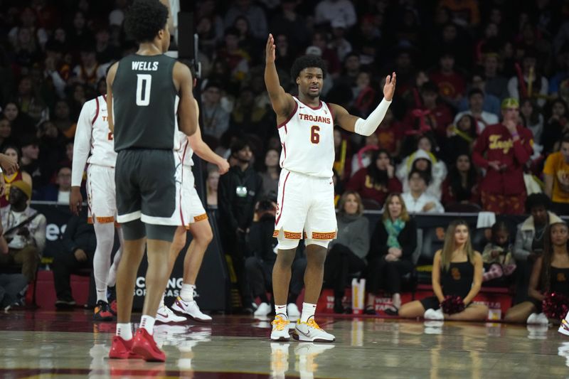 Jan 10, 2024; Los Angeles, California, USA; Southern California Trojans guard Bronny James (6) reacts against the Washington State Cougars in the second half at Galen Center. Mandatory Credit: Kirby Lee-USA TODAY Sports