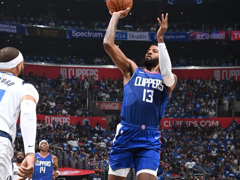 LOS ANGELES, CA - APRIL 21: Paul George #13 of the LA Clippers shoots the ball during the game against the Dallas Mavericks during the 2024 NBA Playoffs on April 21, 2024 at Crypto.Com Arena in Los Angeles, California. NOTE TO USER: User expressly acknowledges and agrees that, by downloading and/or using this Photograph, user is consenting to the terms and conditions of the Getty Images License Agreement. Mandatory Copyright Notice: Copyright 2024 NBAE (Photo by Andrew D. Bernstein/NBAE via Getty Images)