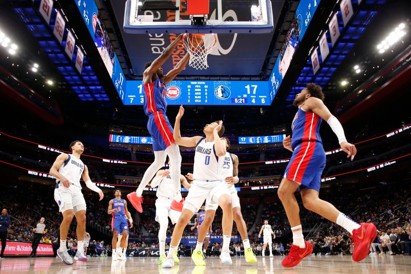 DETROIT, MI - MARCH 9: James Wiseman #13 of the Detroit Pistons dunks the ball during the game against the Dallas Mavericks on March 9, 2024 at Little Caesars Arena in Detroit, Michigan. NOTE TO USER: User expressly acknowledges and agrees that, by downloading and/or using this photograph, User is consenting to the terms and conditions of the Getty Images License Agreement. Mandatory Copyright Notice: Copyright 2024 NBAE (Photo by Brian Sevald/NBAE via Getty Images)