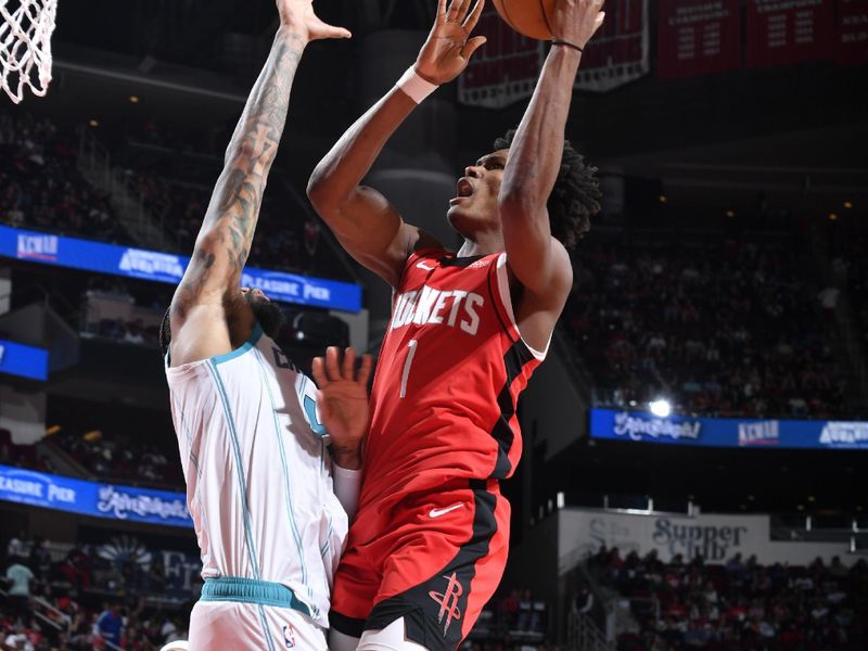 HOUSTON, TX - OCTOBER 23: Amen Thompson #1 of the Houston Rockets shoots the ball during the game against the Charlotte Hornets  during a regular season game on October 23, 2024 at the Toyota Center in Houston, Texas. NOTE TO USER: User expressly acknowledges and agrees that, by downloading and or using this photograph, User is consenting to the terms and conditions of the Getty Images License Agreement. Mandatory Copyright Notice: Copyright 2024 NBAE (Photo by Logan Riely/NBAE via Getty Images)