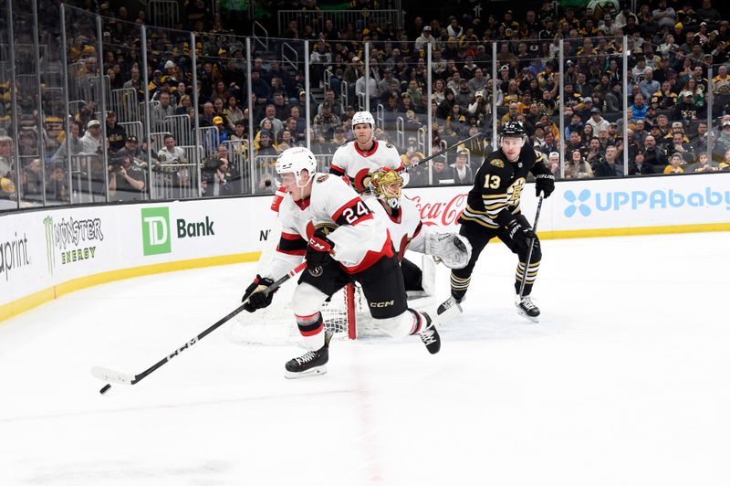 Mar 19, 2024; Boston, Massachusetts, USA;  Ottawa Senators defenseman Jacob Bernard-Docker (24) skates with the puck while Boston Bruins center Charlie Coyle (13) looks on during the first period at TD Garden. Mandatory Credit: Bob DeChiara-USA TODAY Sports