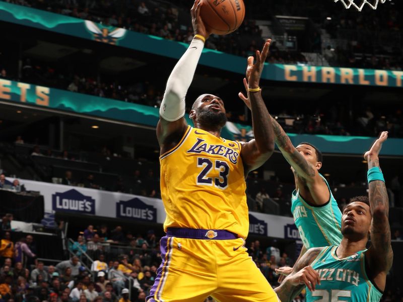 CHARLOTTE, NC - FEBRUARY 5: LeBron James #23 of the Los Angeles Lakers drives to the basket during the game against the Charlotte Hornets on February 5, 2024 at Spectrum Center in Charlotte, North Carolina. NOTE TO USER: User expressly acknowledges and agrees that, by downloading and or using this photograph, User is consenting to the terms and conditions of the Getty Images License Agreement. Mandatory Copyright Notice: Copyright 2024 NBAE (Photo by Kent Smith/NBAE via Getty Images)