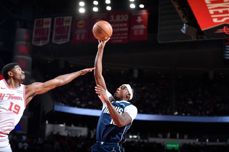 HOUSTON, TX - MARCH 31: Olivier Maxence-Prosper #18 of the Dallas Mavericks shoots the ball during the game against the Houston Rockets on March 31, 2024 at the Toyota Center in Houston, Texas. NOTE TO USER: User expressly acknowledges and agrees that, by downloading and or using this photograph, User is consenting to the terms and conditions of the Getty Images License Agreement. Mandatory Copyright Notice: Copyright 2024 NBAE (Photo by Logan Riely/NBAE via Getty Images)