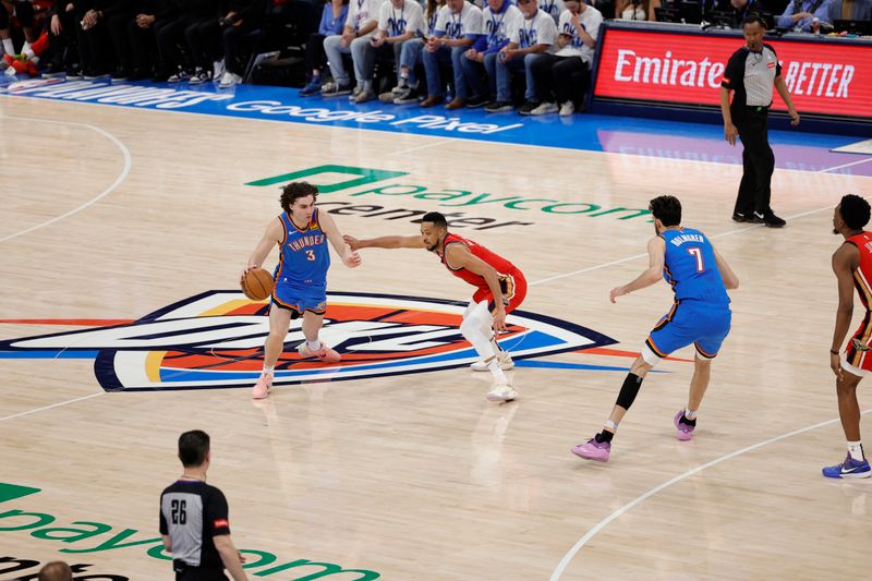 OKLAHOMA CITY, OK - APRIL 24: Josh Giddey #3 of the Oklahoma City Thunder dribbles the ball during the game against the New Orleans Pelicans during Round 1 Game 2 of the 2024 NBA Playoffs on April 24, 2024 at Paycom Arena in Oklahoma City, Oklahoma. NOTE TO USER: User expressly acknowledges and agrees that, by downloading and or using this photograph, User is consenting to the terms and conditions of the Getty Images License Agreement. Mandatory Copyright Notice: Copyright 2024 NBAE (Photo by Martin McGrew/NBAE via Getty Images)