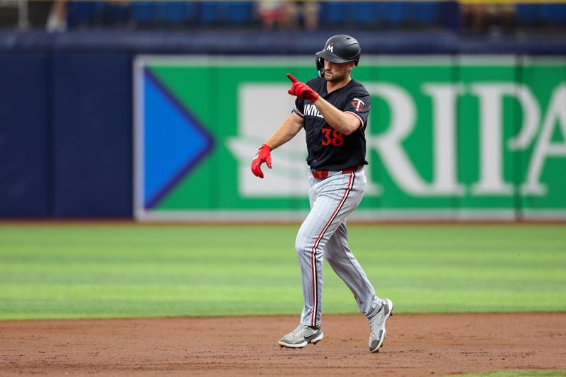 Sep 5, 2024; St. Petersburg, Florida, USA; Minnesota Twins outfielder Matt Wallner (38) runs the bases after hitting a home run against the Tampa Bay Rays in the third inning at Tropicana Field. Mandatory Credit: Nathan Ray Seebeck-Imagn Images