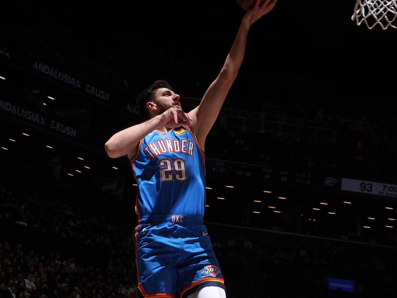 BROOKLYN, NY - JANUARY 5: Vasilije Micic #29 of the Oklahoma City Thunder goes to the basket during the game on January 5, 2024 at Barclays Center in Brooklyn, New York. NOTE TO USER: User expressly acknowledges and agrees that, by downloading and or using this Photograph, user is consenting to the terms and conditions of the Getty Images License Agreement. Mandatory Copyright Notice: Copyright 2024 NBAE (Photo by Nathaniel S. Butler/NBAE via Getty Images)