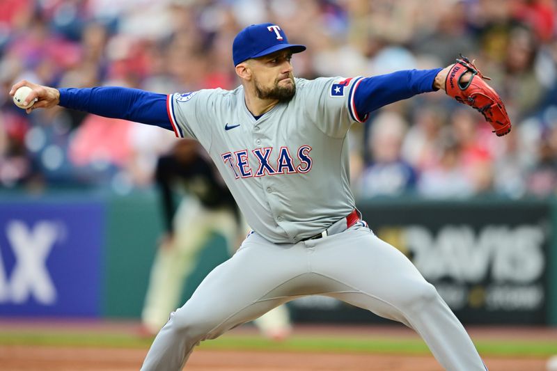 Aug 23, 2024; Cleveland, Ohio, USA; Texas Rangers starting pitcher Nathan Eovaldi (17) throws a pitch during the first inning against the Cleveland Guardians at Progressive Field. Mandatory Credit: Ken Blaze-USA TODAY Sports