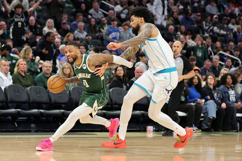 MILWAUKEE, WISCONSIN - FEBRUARY 09: Damian Lillard #0 of the Milwaukee Bucks is defended by Nick Richards #4 of the Charlotte Hornets during a game at Fiserv Forum on February 09, 2024 in Milwaukee, Wisconsin. NOTE TO USER: User expressly acknowledges and agrees that, by downloading and or using this photograph, User is consenting to the terms and conditions of the Getty Images License Agreement. (Photo by Stacy Revere/Getty Images)