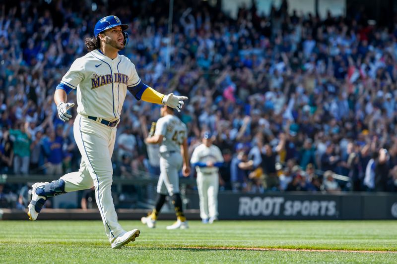 May 28, 2023; Seattle, Washington, USA; Seattle Mariners third baseman Eugenio Suarez (28) celebrates after hitting a walk-off three-run home run against the Pittsburgh Pirates during the tenth inning at T-Mobile Park. Seattle defeated Pittsburgh, 6-3. Mandatory Credit: Joe Nicholson-USA TODAY Sports