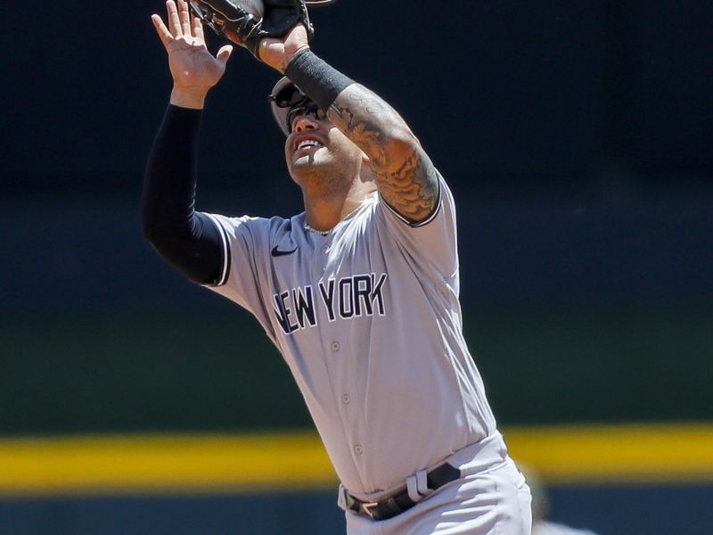 May 21, 2023; Cincinnati, Ohio, USA; New York Yankees second baseman Gleyber Torres (25) catches a pop up hit by Cincinnati Reds right fielder Will Benson (not pictured) in the seventh inning at Great American Ball Park. Mandatory Credit: Katie Stratman-USA TODAY Sports