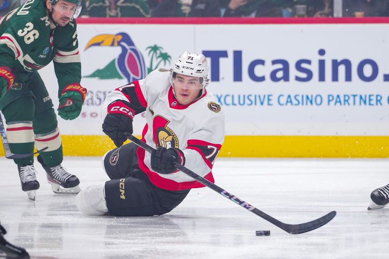 Apr 2, 2024; Saint Paul, Minnesota, USA; Ottawa Senators center Ridly Greig (71) passes against the Minnesota Wild in the first period at Xcel Energy Center. Mandatory Credit: Brad Rempel-USA TODAY Sports