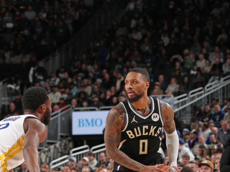 MILWAUKEE, WI - JANUARY 13: Damian Lillard #0 of the Milwaukee Bucks looks to pass the ball during the game against the Golden State Warriors on January 13, 2024 at the Fiserv Forum Center in Milwaukee, Wisconsin. NOTE TO USER: User expressly acknowledges and agrees that, by downloading and or using this Photograph, user is consenting to the terms and conditions of the Getty Images License Agreement. Mandatory Copyright Notice: Copyright 2024 NBAE (Photo by Gary Dineen/NBAE via Getty Images).