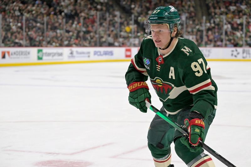 Mar 14, 2024; Saint Paul, Minnesota, USA; Minnesota Wild forward Kirill Kaprizov (97) follows the play against the Anaheim Ducks during the second period at Xcel Energy Center. Mandatory Credit: Nick Wosika-USA TODAY Sports