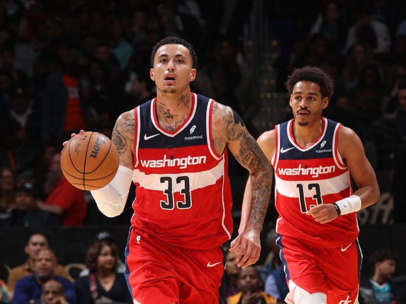 WASHINGTON, DC -? MARCH 8:  Kyle Kuzma #33 of the Washington Wizards handles the ball during the game  on March 8, 2024 at Capital One Arena in Washington, DC. NOTE TO USER: User expressly acknowledges and agrees that, by downloading and or using this Photograph, user is consenting to the terms and conditions of the Getty Images License Agreement. Mandatory Copyright Notice: Copyright 2024 NBAE (Photo by Stephen Gosling/NBAE via Getty Images)