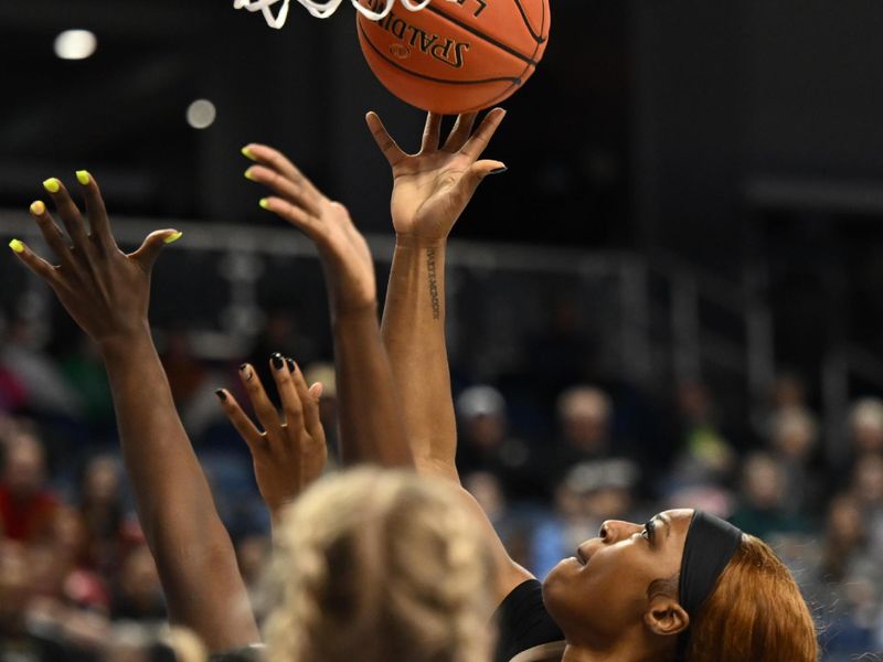 Mar 3, 2023; Greensboro, NC, USA; Wake Forest Demon Deacons forward Demeara Hinds (25) shoots under the basket during the first half at Greensboro Coliseum. Mandatory Credit: William Howard-USA TODAY Sports