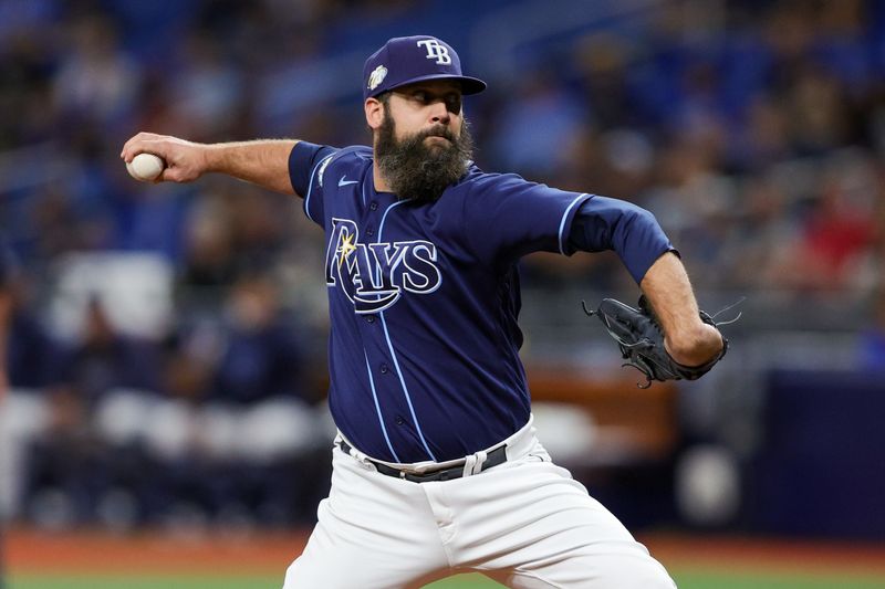 Sep 7, 2023; St. Petersburg, Florida, USA;  Tampa Bay Rays relief pitcher Andrew Kittredge (36) throws a pitch against the Seattle Mariners in the ninth inning at Tropicana Field. Mandatory Credit: Nathan Ray Seebeck-USA TODAY Sports