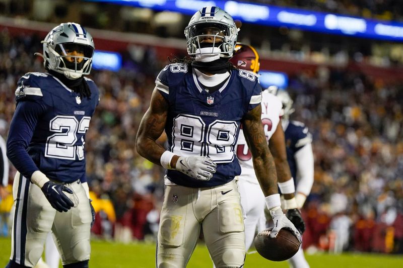 Dallas Cowboys wide receiver CeeDee Lamb (88) celebrates after scoring a touchdown against the Washington Commanders during the first half, Sunday, January 7, 2024, in Landover, Md. Dallas won 38-10. (AP Photo/Jess Rapfogel)