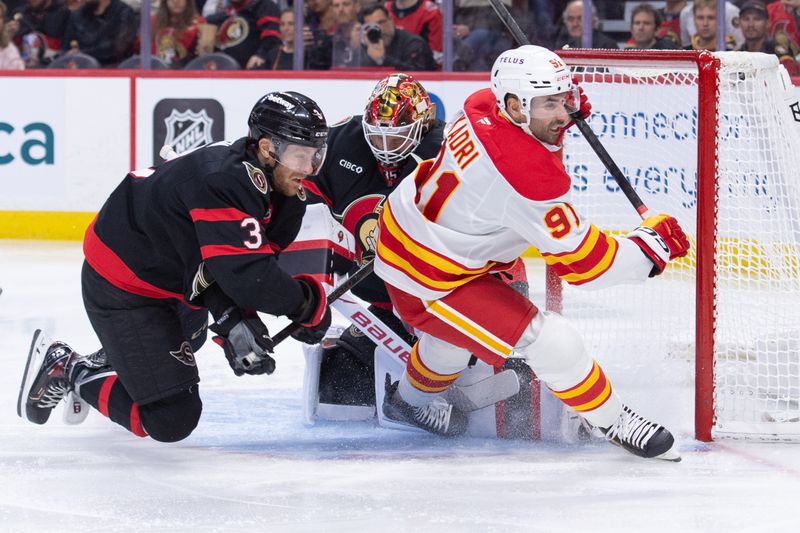 Oct 30, 2025; Ottawa, Ontario, CAN; Ottawa Senators defenseman Nick Jensen (3) is called for hooking on Calgary Flames center Nazem kadri (91) in the second period at the Canadian Tire Centre. Mandatory Credit: Marc DesRosiers-IMAGN Images