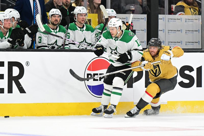 Apr 27, 2024; Las Vegas, Nevada, USA; Dallas Stars center Logan Stankoven (11) and Vegas Golden Knights right wing Jonathan Marchessault (81) chase after the puck in the second period in game three of the first round of the 2024 Stanley Cup Playoffs at T-Mobile Arena. Mandatory Credit: Candice Ward-USA TODAY Sports