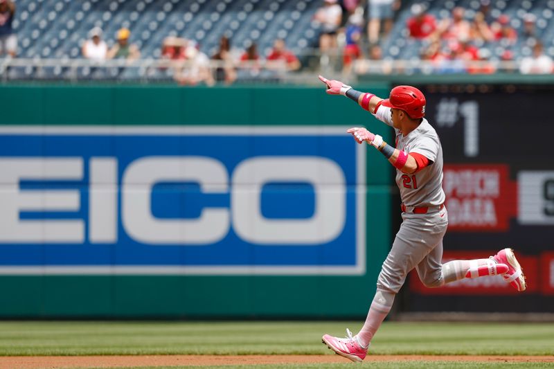 May 11, 2025; Washington, District of Columbia, USA; St. Louis Cardinals outfielder Lars Nootbaar (21) celebrates while rounding the bases after hitting a solo home run against the Washington Nationals during the first inning at Nationals Park. Mandatory Credit: Geoff Burke-Imagn Images