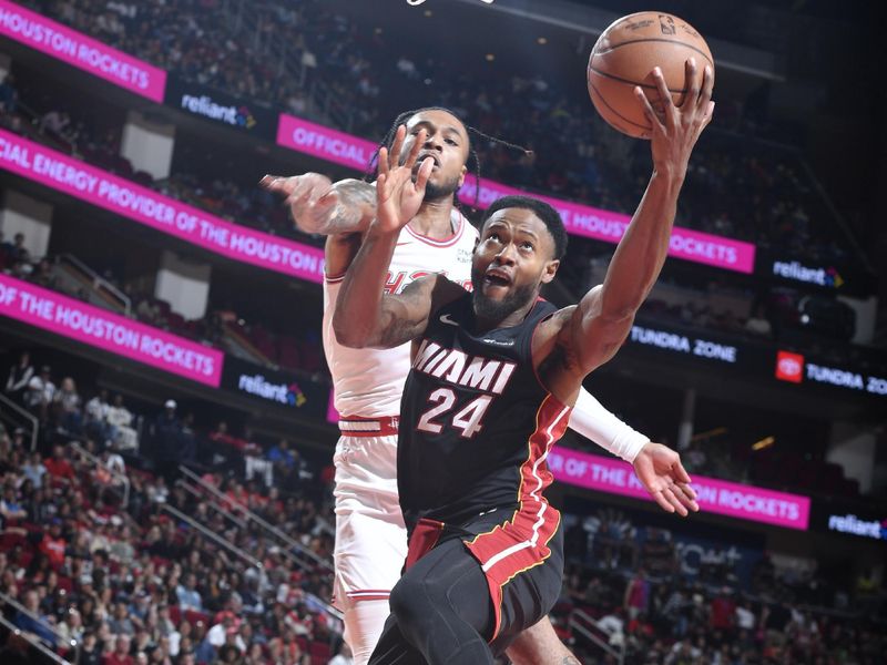 HOUSTON, TX - APRIL 5: Haywood Highsmith #24 of the Miami Heat drives to the basket during the game against the Houston Rockets on April 5, 2024 at the Toyota Center in Houston, Texas. NOTE TO USER: User expressly acknowledges and agrees that, by downloading and or using this photograph, User is consenting to the terms and conditions of the Getty Images License Agreement. Mandatory Copyright Notice: Copyright 2024 NBAE (Photo by Logan Riely/NBAE via Getty Images)