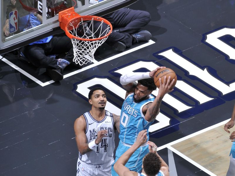 ORLANDO, FL - FEBRUARY 12:Miles Bridges #0 of the Charlotte Hornets goes up for the rebound during the game against the Orlando Magic on February 12, 2025 at Kia Center in Orlando, Florida. NOTE TO USER: User expressly acknowledges and agrees that, by downloading and or using this photograph, User is consenting to the terms and conditions of the Getty Images License Agreement. Mandatory Copyright Notice: Copyright 2025 NBAE (Photo by Fernando Medina/NBAE via Getty Images)