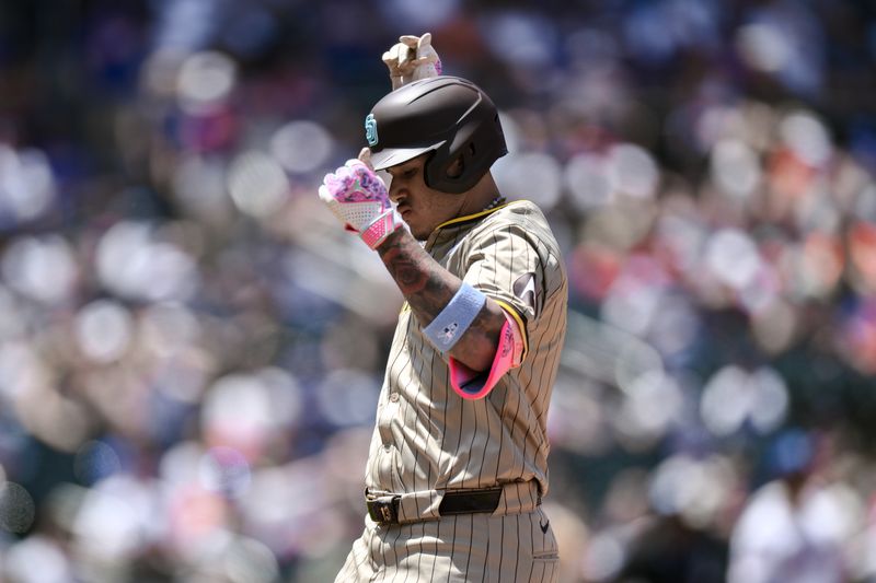 Jun 16, 2024; New York City, New York, USA; San Diego Padres third baseman Manny Machado (13) reacts after hitting an RBI single against the New York Mets during the first inning at Citi Field. Mandatory Credit: John Jones-USA TODAY Sports