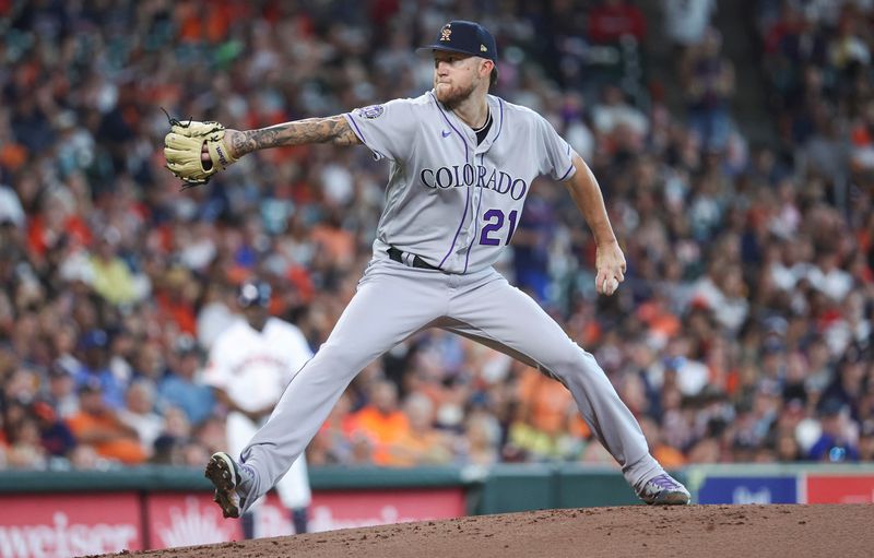 Jul 4, 2023; Houston, Texas, USA; Colorado Rockies starting pitcher Kyle Freeland (21) delivers a pitch during the first inning against the Houston Astros at Minute Maid Park. Mandatory Credit: Troy Taormina-USA TODAY Sports