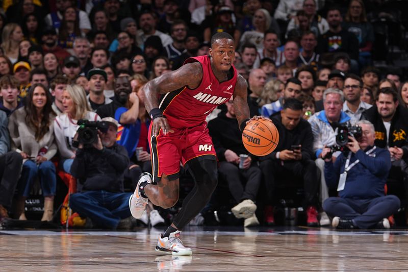 DENVER, CO - NOVEMBER 8: Terry Rozier #2 of the Miami Heat dribbles the ball during the game against the Denver Nuggets on November 8, 2024 at Ball Arena in Denver, Colorado. NOTE TO USER: User expressly acknowledges and agrees that, by downloading and/or using this Photograph, user is consenting to the terms and conditions of the Getty Images License Agreement. Mandatory Copyright Notice: Copyright 2024 NBAE (Photo by Bart Young/NBAE via Getty Images)