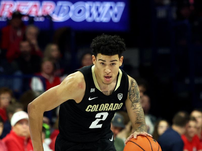 Jan 4, 2024; Tucson, Arizona, USA;Colorado Buffaloes guard KJ Simpson (2) drives to the net against Arizona Wildcats during the first half at McKale Center. Mandatory Credit: Zachary BonDurant-USA TODAY Sports