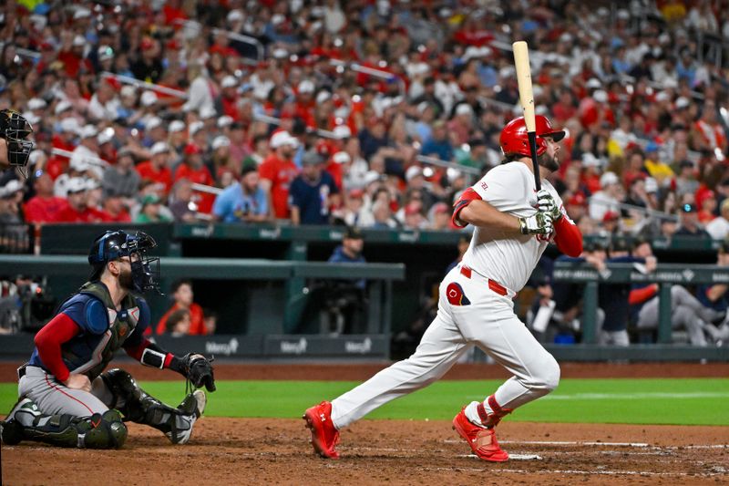 May 17, 2024; St. Louis, Missouri, USA;  St. Louis Cardinals designated hitter Alec Burleson (41) hits a one run single against the Boston Red Sox during the seventh inning at Busch Stadium. Mandatory Credit: Jeff Curry-USA TODAY Sports