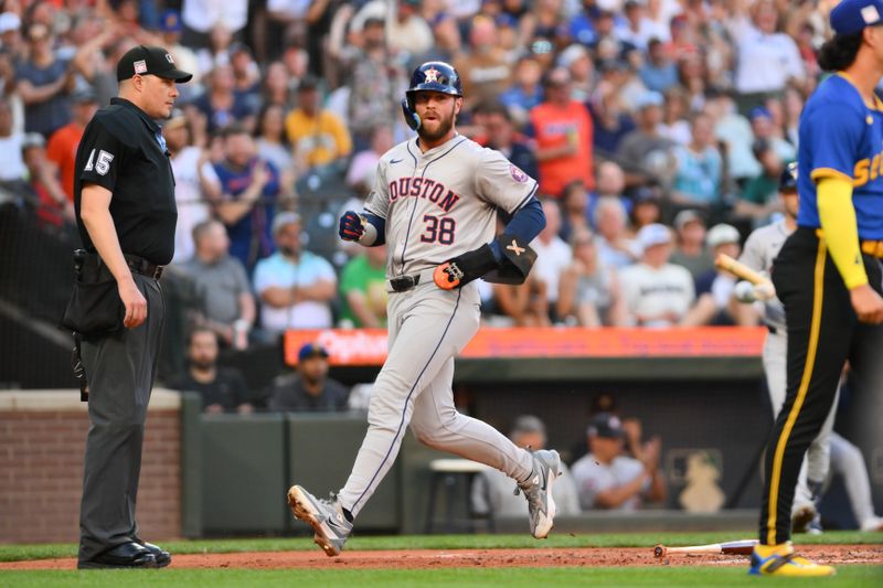 Jul 19, 2024; Seattle, Washington, USA; Houston Astros right fielder Trey Cabbage (38) scores a run against the Seattle Mariners during the third inning at T-Mobile Park. Mandatory Credit: Steven Bisig-USA TODAY Sports