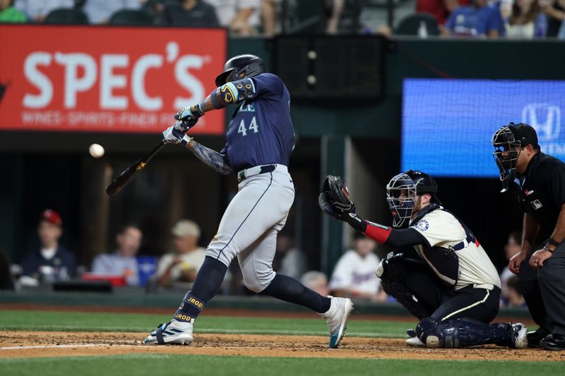 Sep 20, 2024; Arlington, Texas, USA; Seattle Mariners center fielder Julio Rodriguez (44) hits a three-run home run against the Texas Rangers in the fifth inning at Globe Life Field. Mandatory Credit: Tim Heitman-Imagn Images