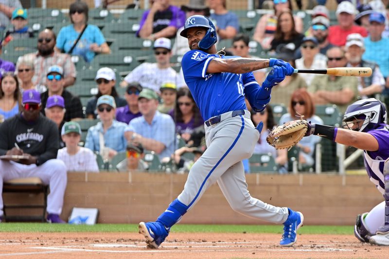 Mar 12, 2024; Salt River Pima-Maricopa, Arizona, USA;  Kansas City Royals third baseman Maikel Garcia (11) hits a two run home run in the first inning against the Colorado Rockies during a spring training game at Salt River Fields at Talking Stick. Mandatory Credit: Matt Kartozian-USA TODAY Sports