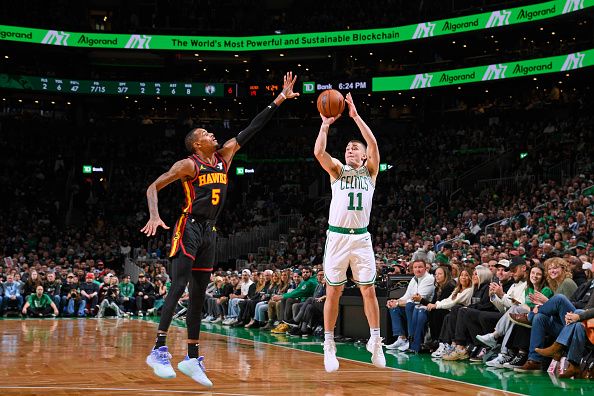 BOSTON, MA - November 26: Payton Pritchard #11 of the Boston Celtics shoots a three point basket during the game against the Atlanta Hawks on November 26, 2023 at the TD Garden in Boston, Massachusetts. NOTE TO USER: User expressly acknowledges and agrees that, by downloading and or using this photograph, User is consenting to the terms and conditions of the Getty Images License Agreement. Mandatory Copyright Notice: Copyright 2023 NBAE  (Photo by Brian Babineau/NBAE via Getty Images)