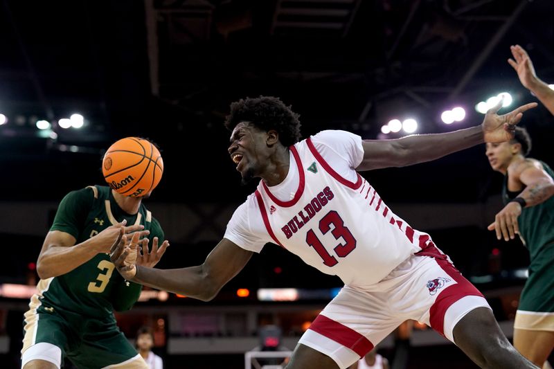 Feb 3, 2024; Fresno, California, USA; Fresno State Bulldogs center Enoch Boakye (13) is unable to gain control of the ball next to Colorado State Rams guard Josiah Strong (3) in the second half at the Save Mart Center. Mandatory Credit: Cary Edmondson-USA TODAY Sports