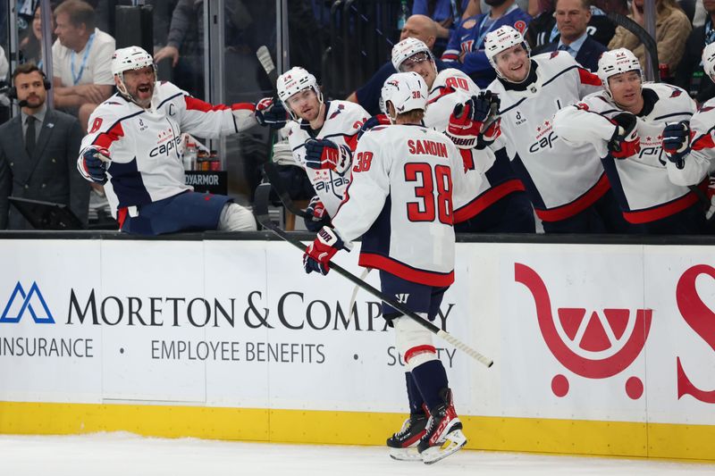 Mar 26, 2026; Salt Lake City, Utah, USA; The Washington Capitals celebrate a goal against the Utah Mammoth by defenseman Rasmus Sandin (38) during the third period at Delta Center. Mandatory Credit: Rob Gray-Imagn Images