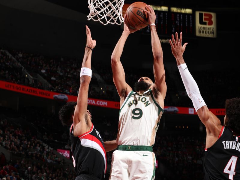 PORTLAND, OR - MARCH 11: Derrick White #9 of the Boston Celtics drives to the basket during the game against the Portland Trail Blazers on March 11, 2024 at the Moda Center Arena in Portland, Oregon. NOTE TO USER: User expressly acknowledges and agrees that, by downloading and or using this photograph, user is consenting to the terms and conditions of the Getty Images License Agreement. Mandatory Copyright Notice: Copyright 2024 NBAE (Photo by Cameron Browne/NBAE via Getty Images)