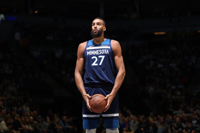 MINNEAPOLIS, MN -  NOVEMBER 10: Rudy Gobert #27 of the Minnesota Timberwolves shoots a free throw during the game against the Miami Heat on November 10, 2024 at Target Center in Minneapolis, Minnesota. NOTE TO USER: User expressly acknowledges and agrees that, by downloading and or using this Photograph, user is consenting to the terms and conditions of the Getty Images License Agreement. Mandatory Copyright Notice: Copyright 2024 NBAE (Photo by David Sherman/NBAE via Getty Images)