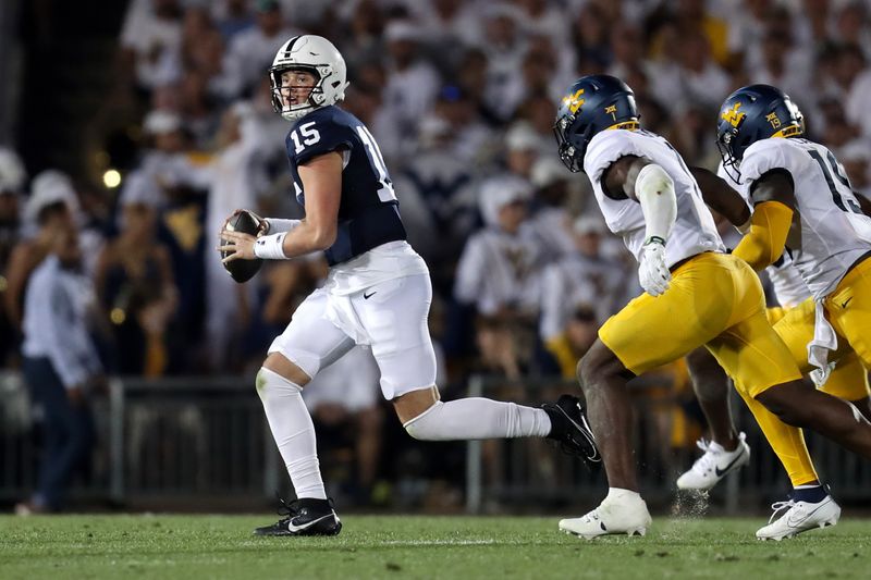 Sep 2, 2023; University Park, Pennsylvania, USA; Penn State Nittany Lions quarterback Drew Allar (15) runs with the ball during the third quarter against the West Virginia Mountaineers at Beaver Stadium. Penn State defeated West Virginia 38-15. Mandatory Credit: Matthew O'Haren-USA TODAY Sports