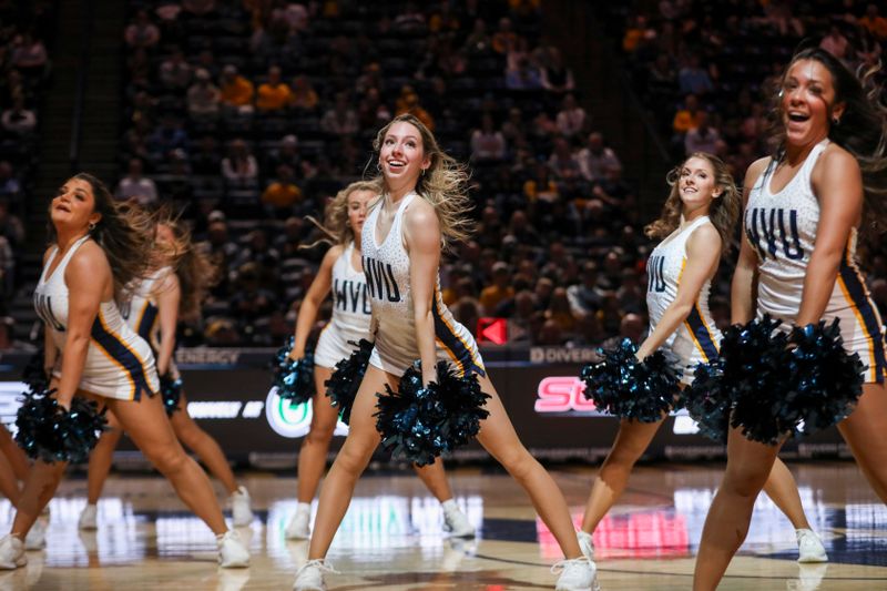Nov 30, 2025; Morgantown, West Virginia, USA; The West Virginia Mountaineers dance team performs during the first half against the Mercyhurst Lakers at Hope Coliseum. Mandatory Credit: Ben Queen-Imagn Images