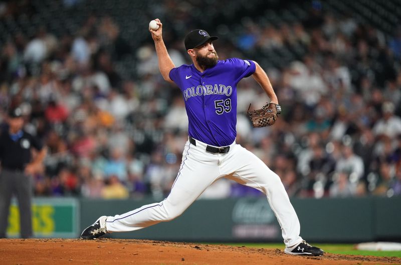 Aug 26, 2024; Denver, Colorado, USA; Colorado Rockies relief pitcher Jake Bird (59) delivers a pitch in the sixth inning against the Miami Marlins at Coors Field. Mandatory Credit: Ron Chenoy-USA TODAY Sports